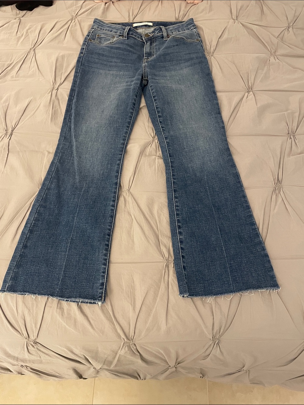 Women's Mid Wash Flare Jeans with Raw Hem